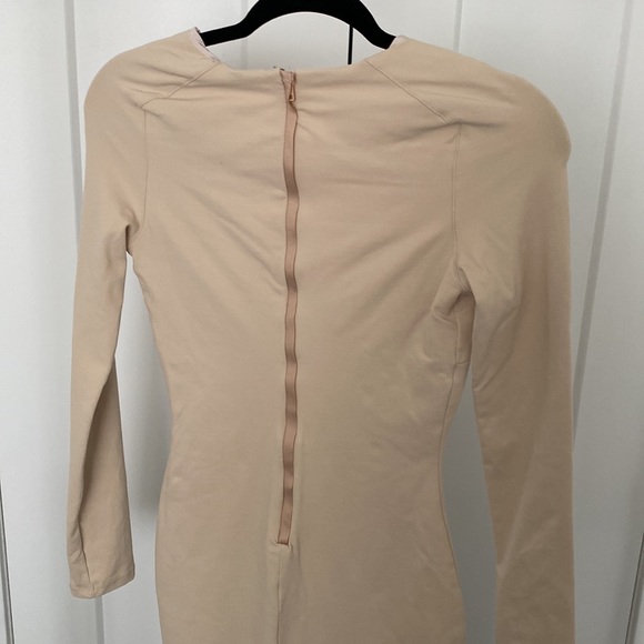 Bebe. Long sleeve dress. Body con. Worn once. Small mark on front. Size XS - Picture 2 of 3